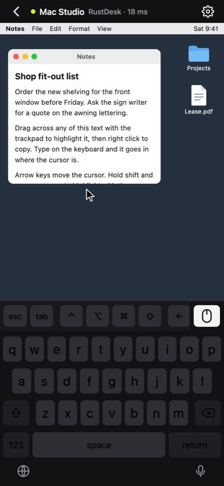 Mockup: iPhone with the remote Mac screen, key bar and keyboard in dark mode